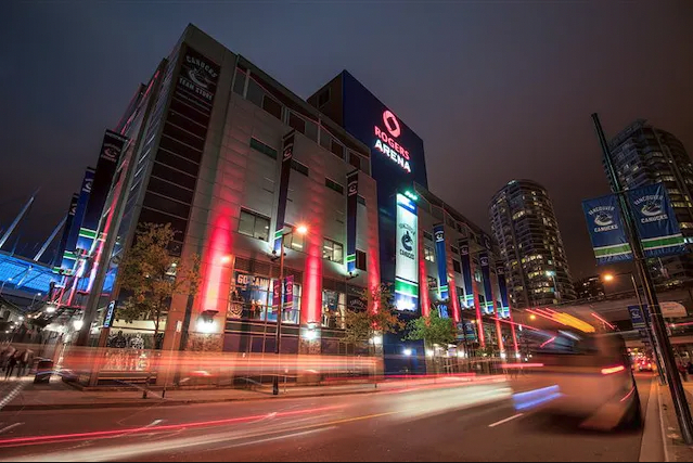 Rogers Arena in Vancouver at night with street lights all around